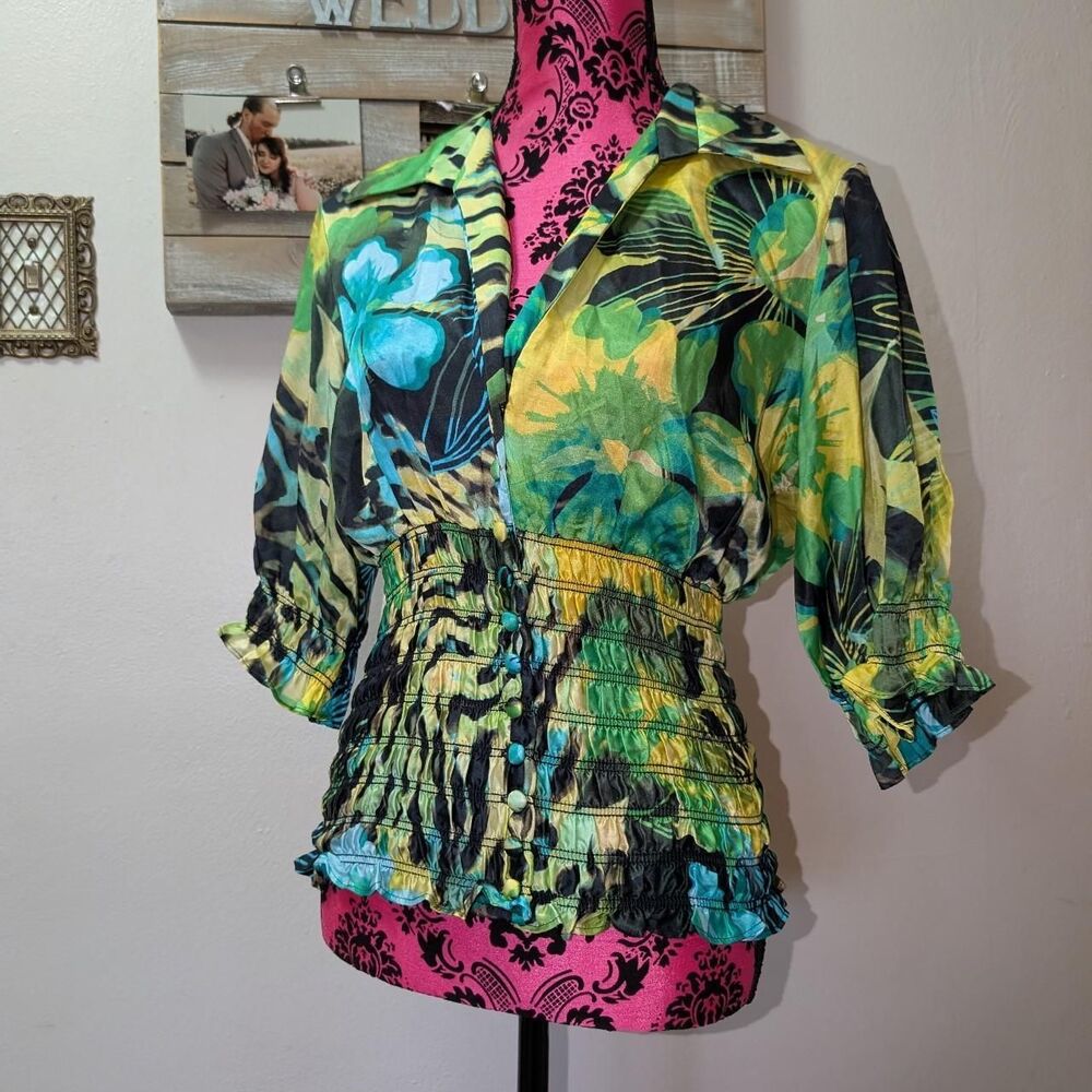 Vintage Cache Women's tropical print multicolor blouse with ruffle hem